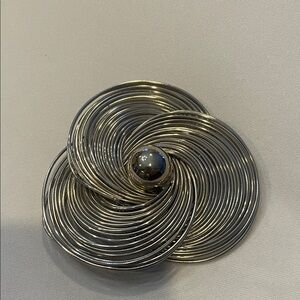 Elegant Silver Swirl Brooch